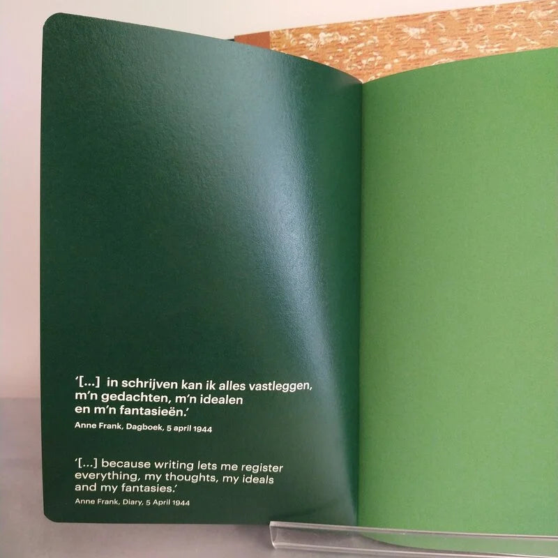 small_green_notebook_inside_cover.webp